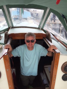 Neil, looking very happy with his new boat, at the Wasahamnen marina in central Stockholm