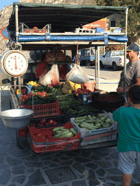 This enterprising local farmer trucks his produce up and down Vathys to supply the local restaurants
